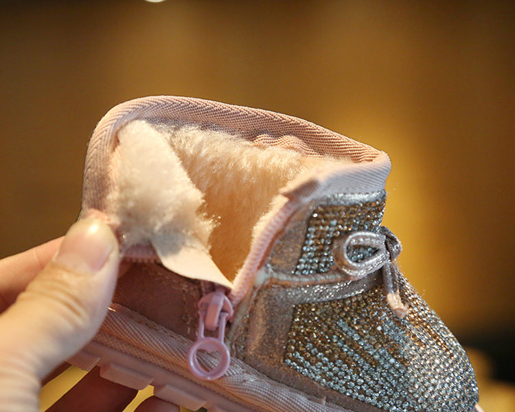 Bota infantil con lazo brillante