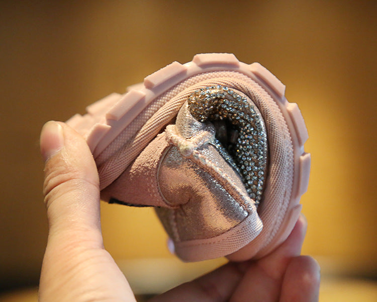 Bota infantil con lazo brillante