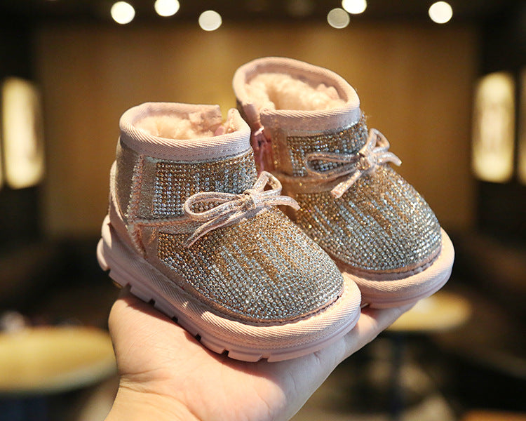 Bota infantil con lazo brillante