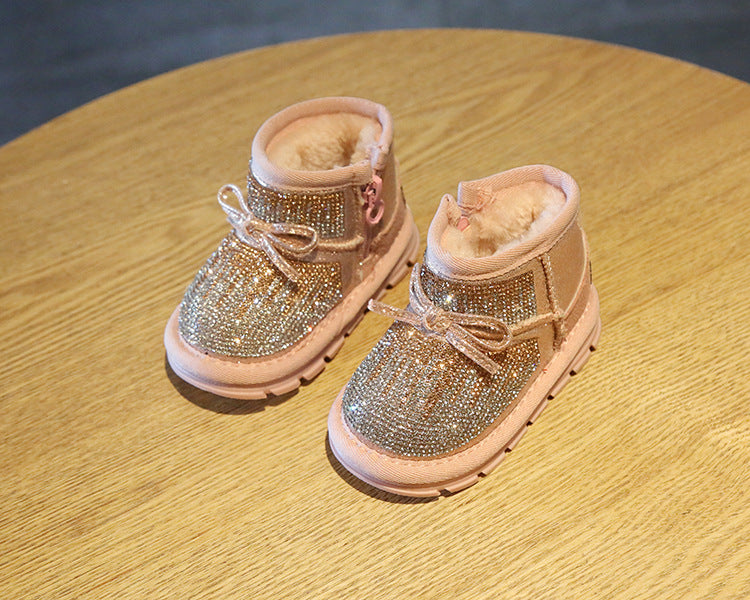Bota infantil con lazo brillante