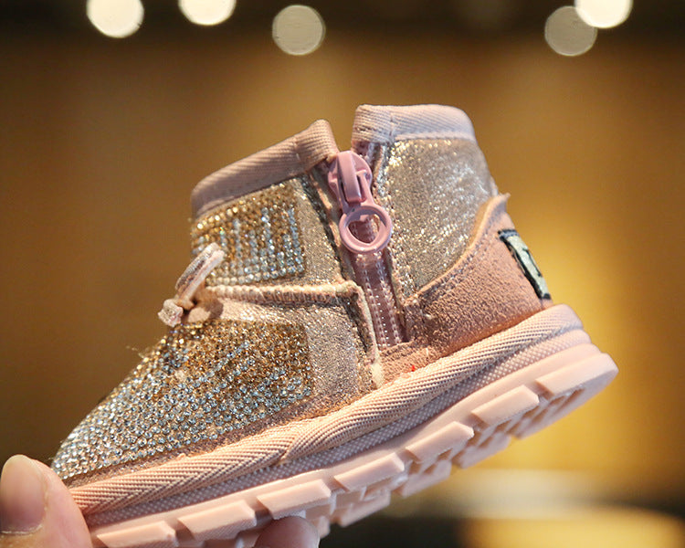 Bota infantil con lazo brillante