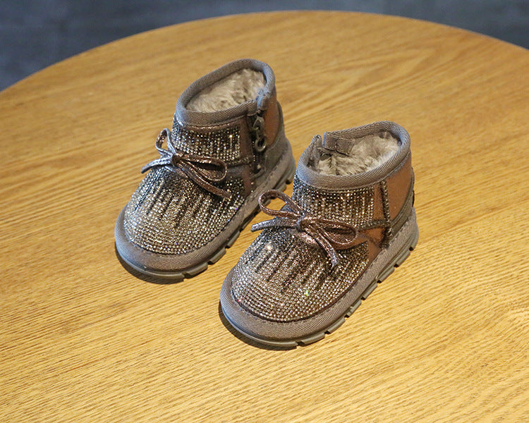 Bota infantil con lazo brillante