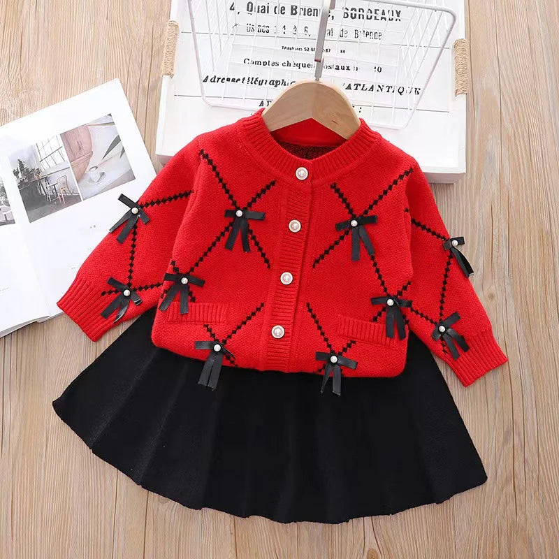 Conjunto de punto para niñas con lazos