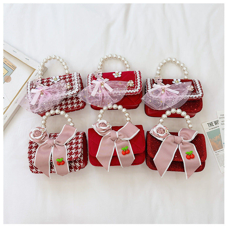 Monedero de Mujer con Perlas y Lazo