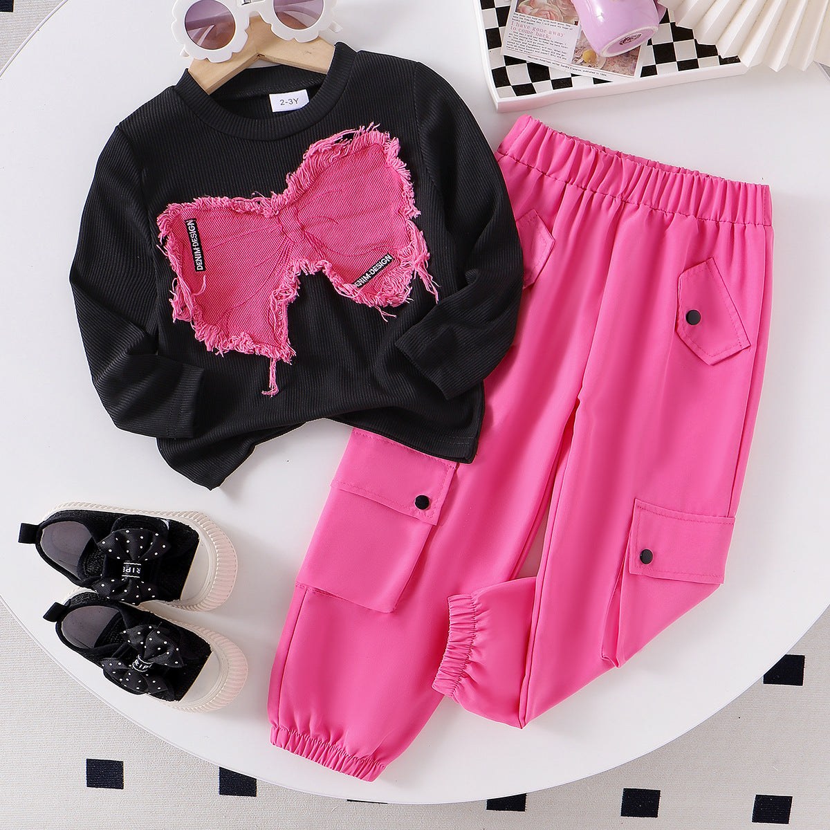 Conjunto rosa y negro para niñas