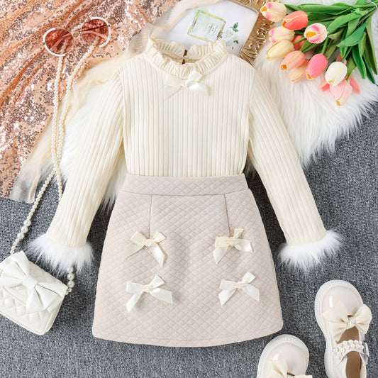 Conjunto de niña con lazos y piel
