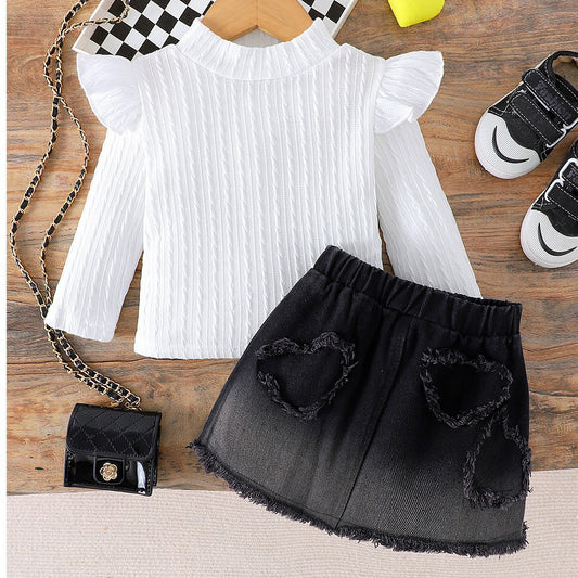 Conjunto de niña blanco y vaqueros