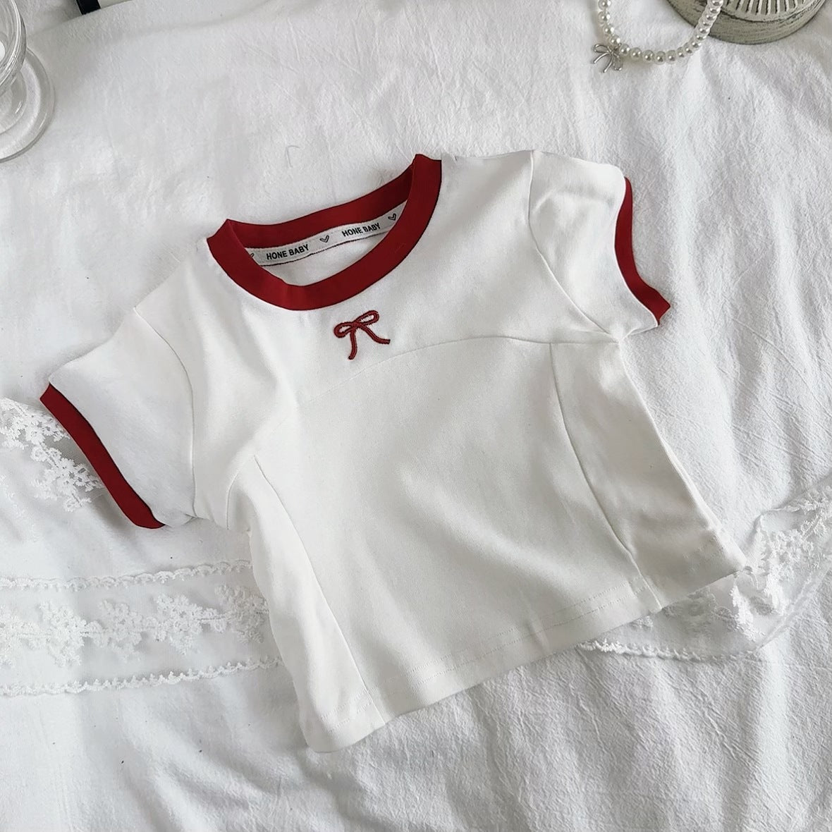 Camiseta de niña con lazo