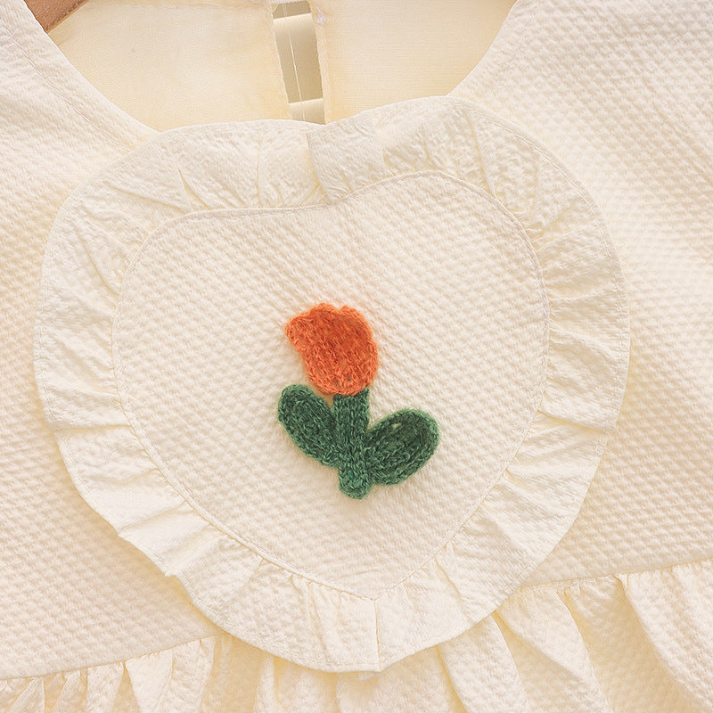 Vestido infantil de manga larga con flor pequeña