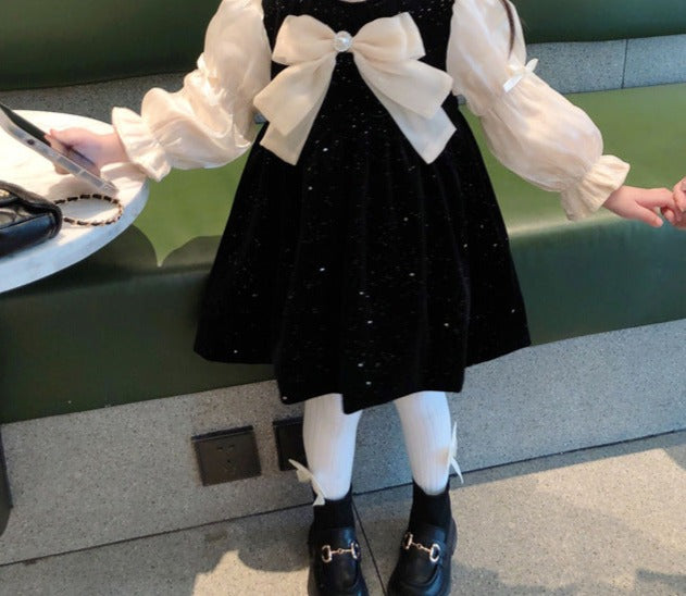 Vestido infantil con lazo brillante