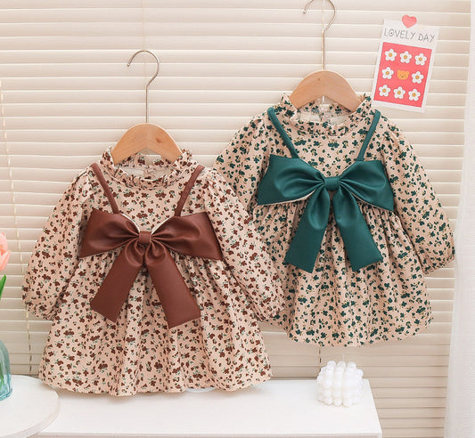 Vestido infantil con flores y lazo