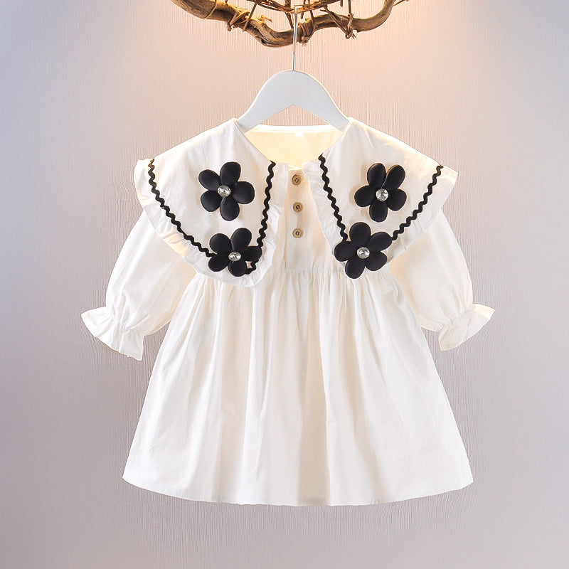 Vestido infantil con cuello de flores