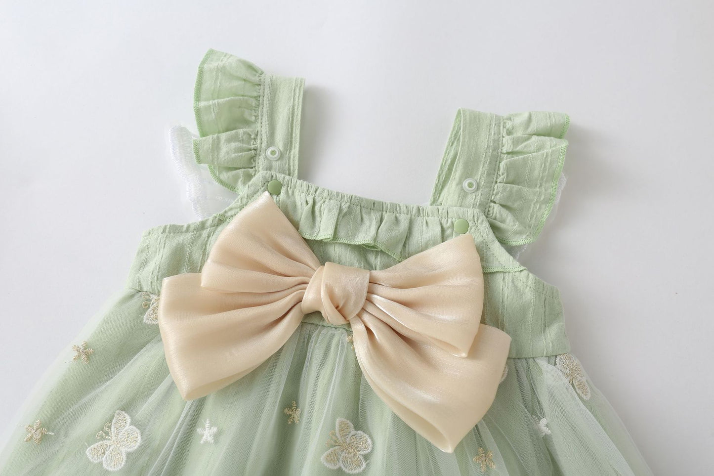 Vestido infantil con mariposas y lazo