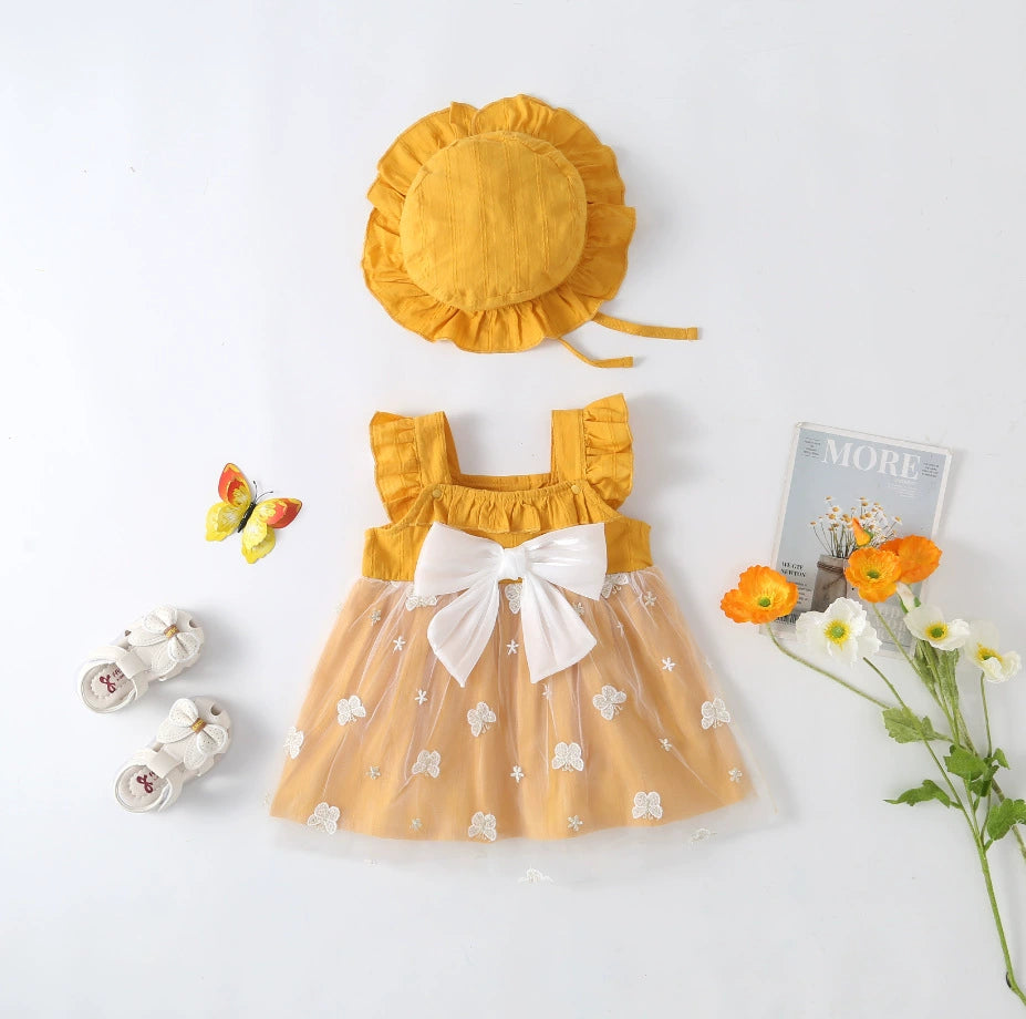 Vestido infantil con mariposas y lazo