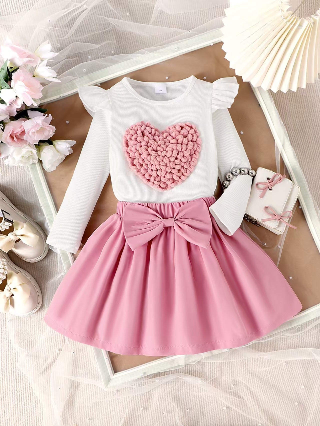 Conjunto de corazón y lazo para niña