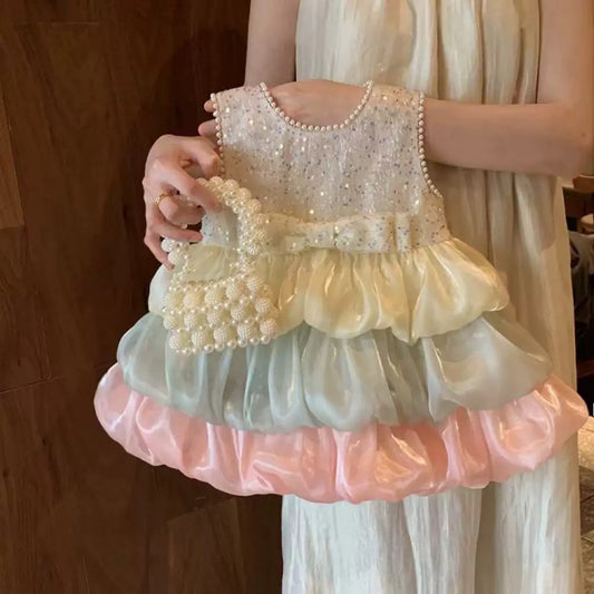 Vestido infantil con lazo brillante