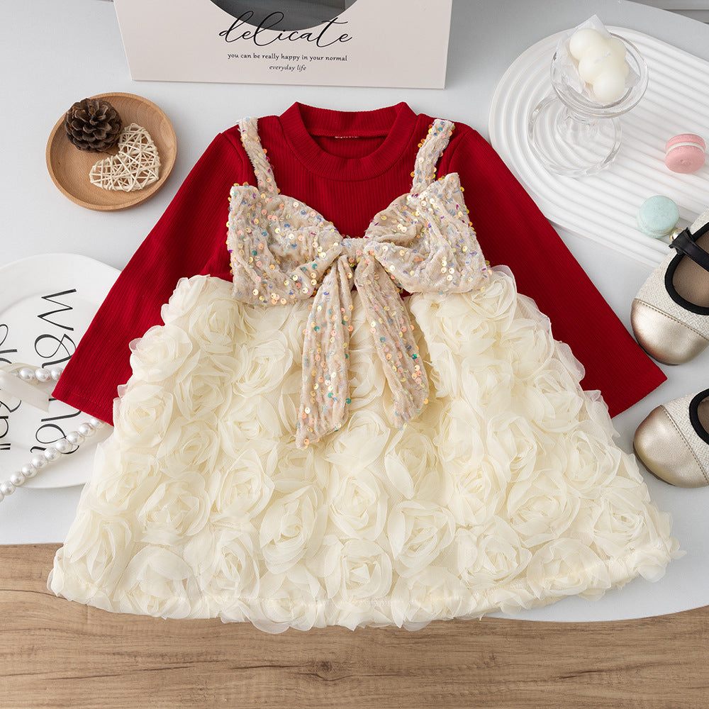 Vestido infantil con flores y lazo brillante