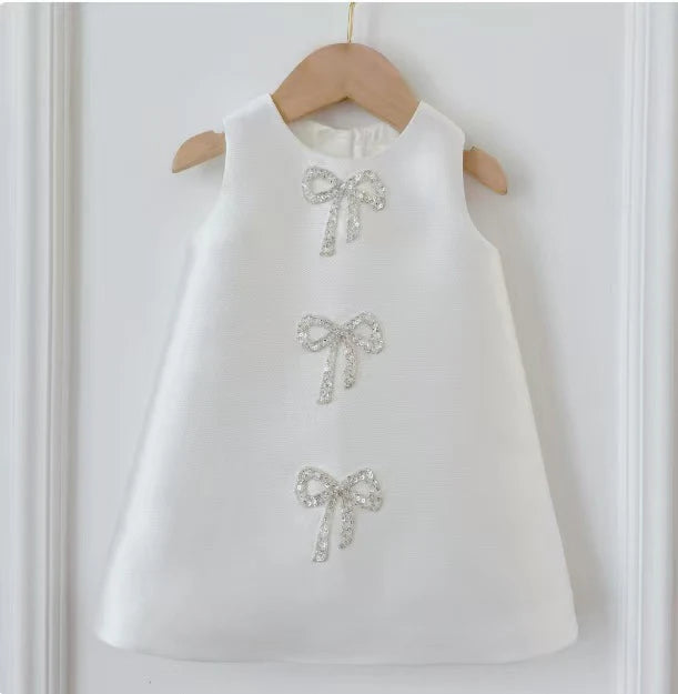 Vestido Infantil con Lazos Brillantes.