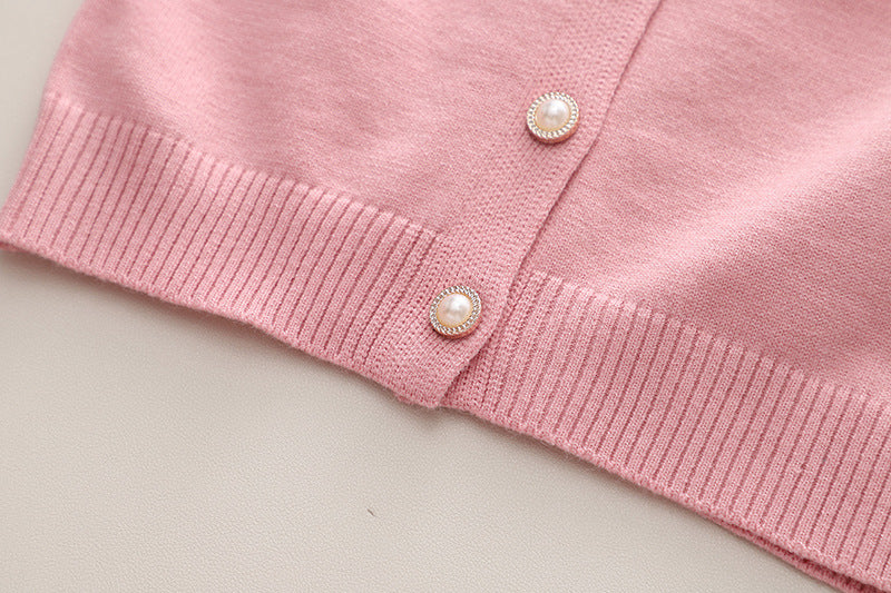 Conjunto Infantil de Tejido de Cuello Floral.