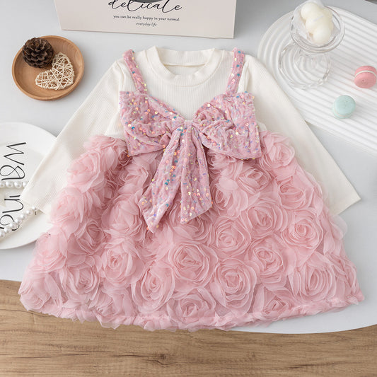 Vestido infantil con flores y lazo brillante