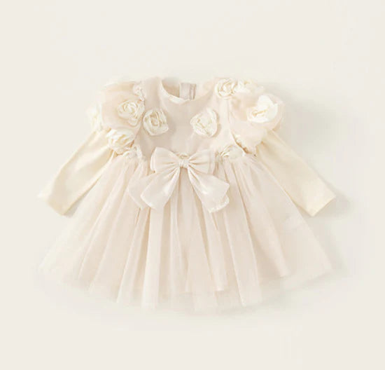 Vestido infantil con flores y lazo
