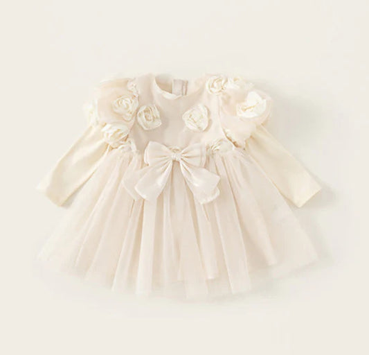 Vestido infantil con flores y lazo