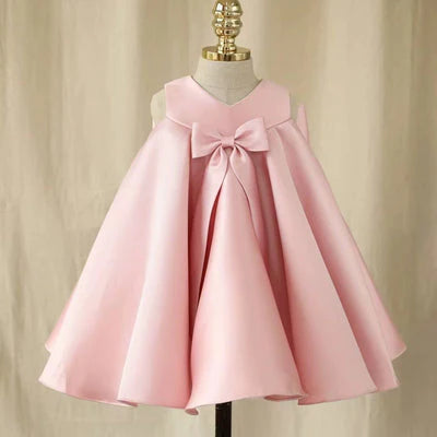 Vestido infantil con lazo rosa
