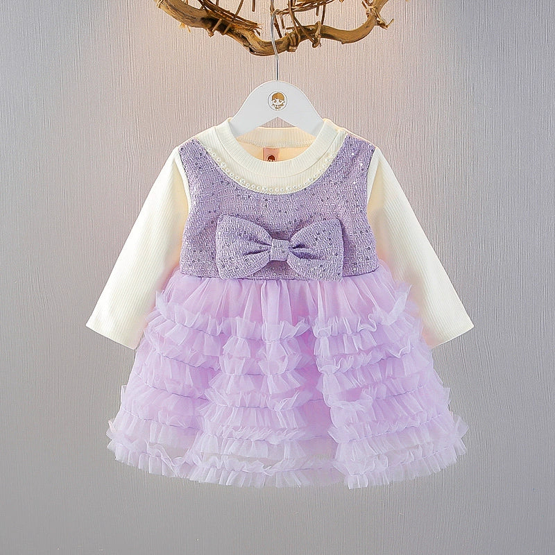 Vestido infantil con lazo y brillos