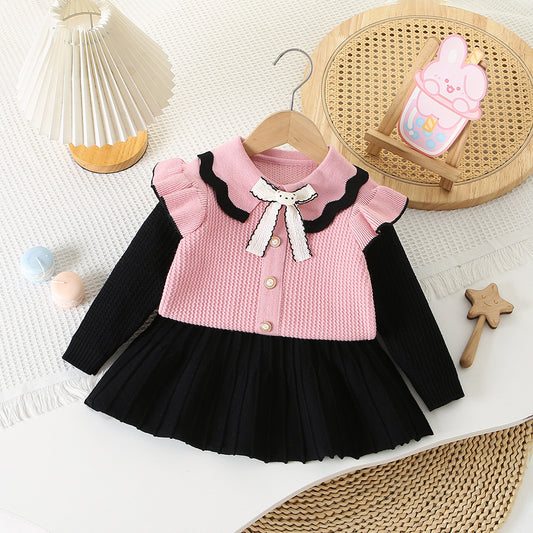 Conjunto de punto con lazo para niña