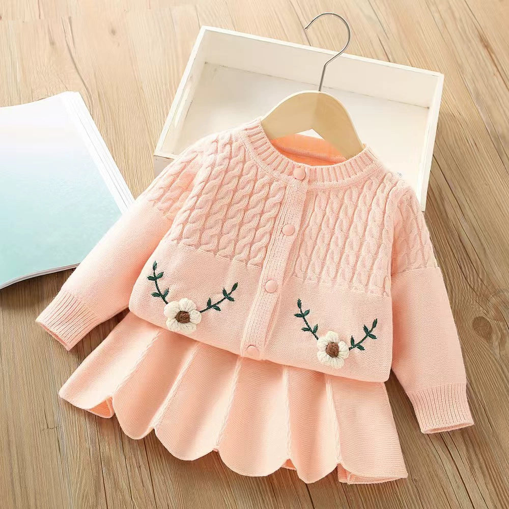 Conjunto de punto con flores para niña