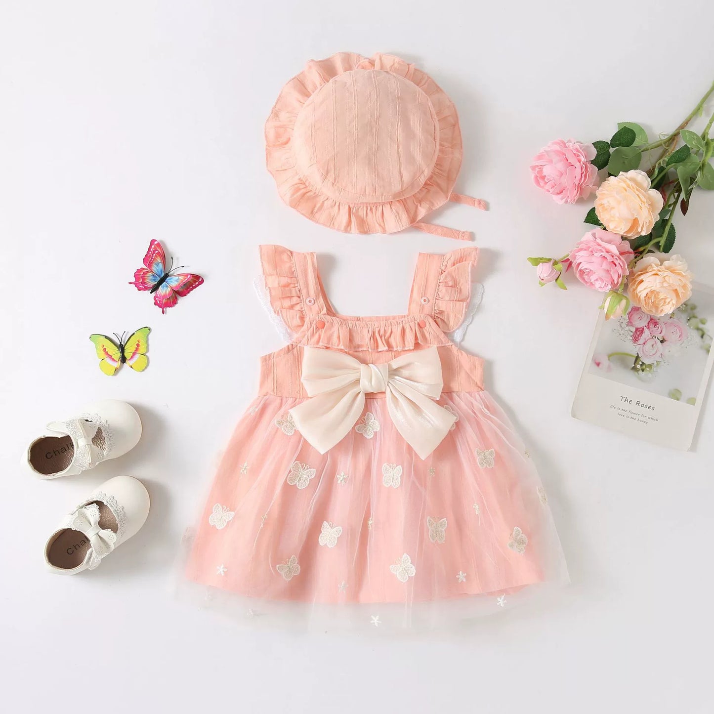 Vestido infantil con mariposas y lazo