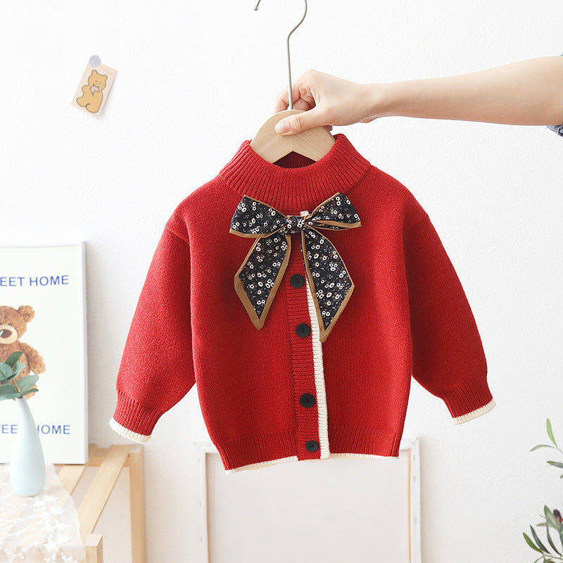 Cárdigan de punto con lazo para niño