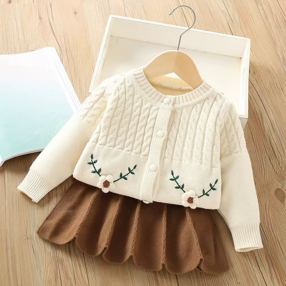 Conjunto de punto con flores para niña