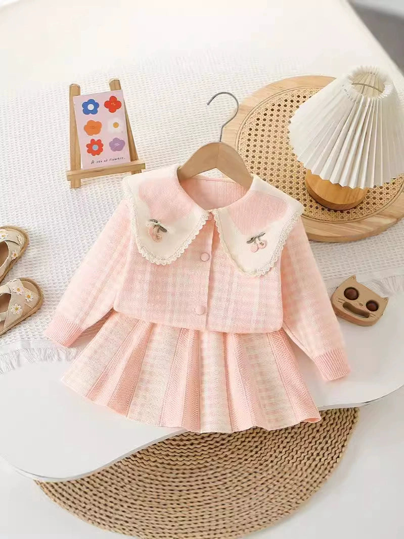 Conjunto de punto a cuadros para niña