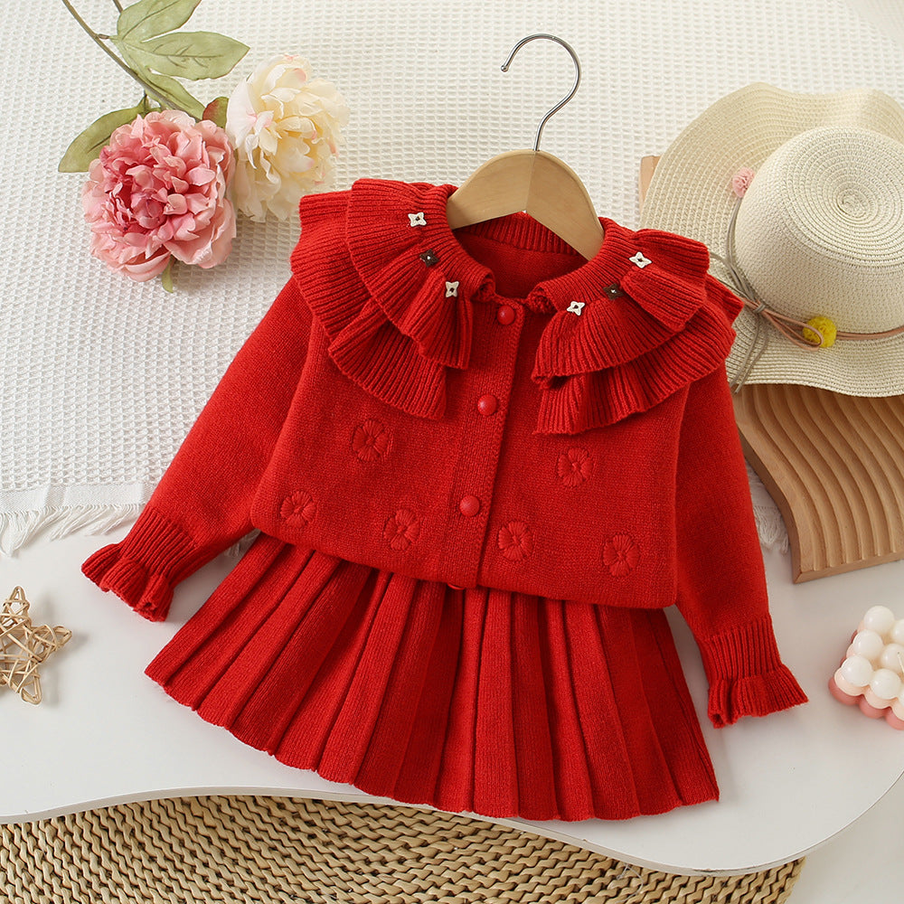 Conjunto de punto con flores para niña