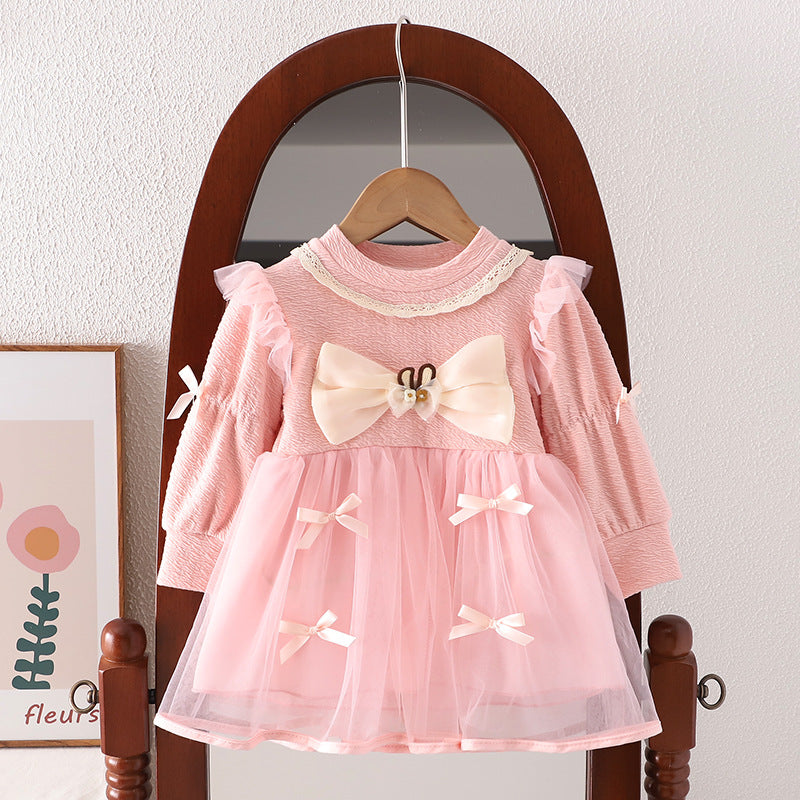 Vestido infantil con lazos