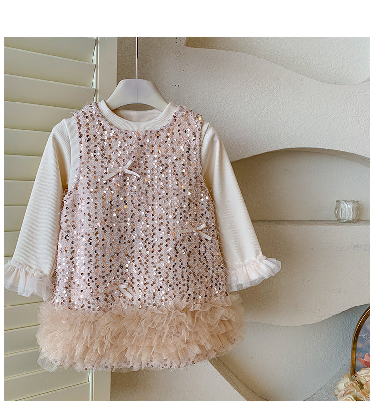 Vestido infantil brillante con lazos