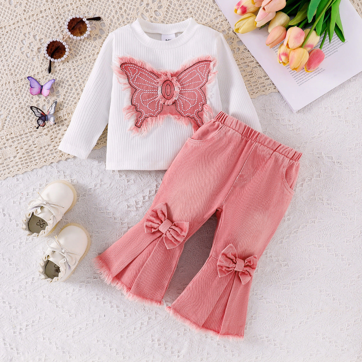 Conjunto de mariposa y vaqueros para niña