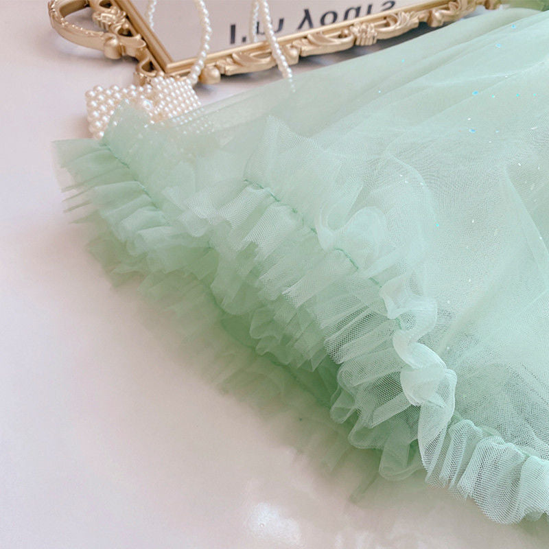 Vestido de fiesta con lazo verde brillante