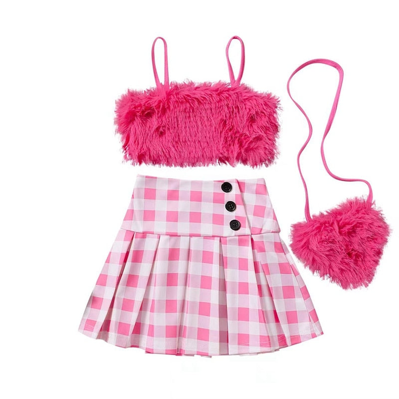 Conjunto infantil femenino de felpa y falda de ajedrez.
