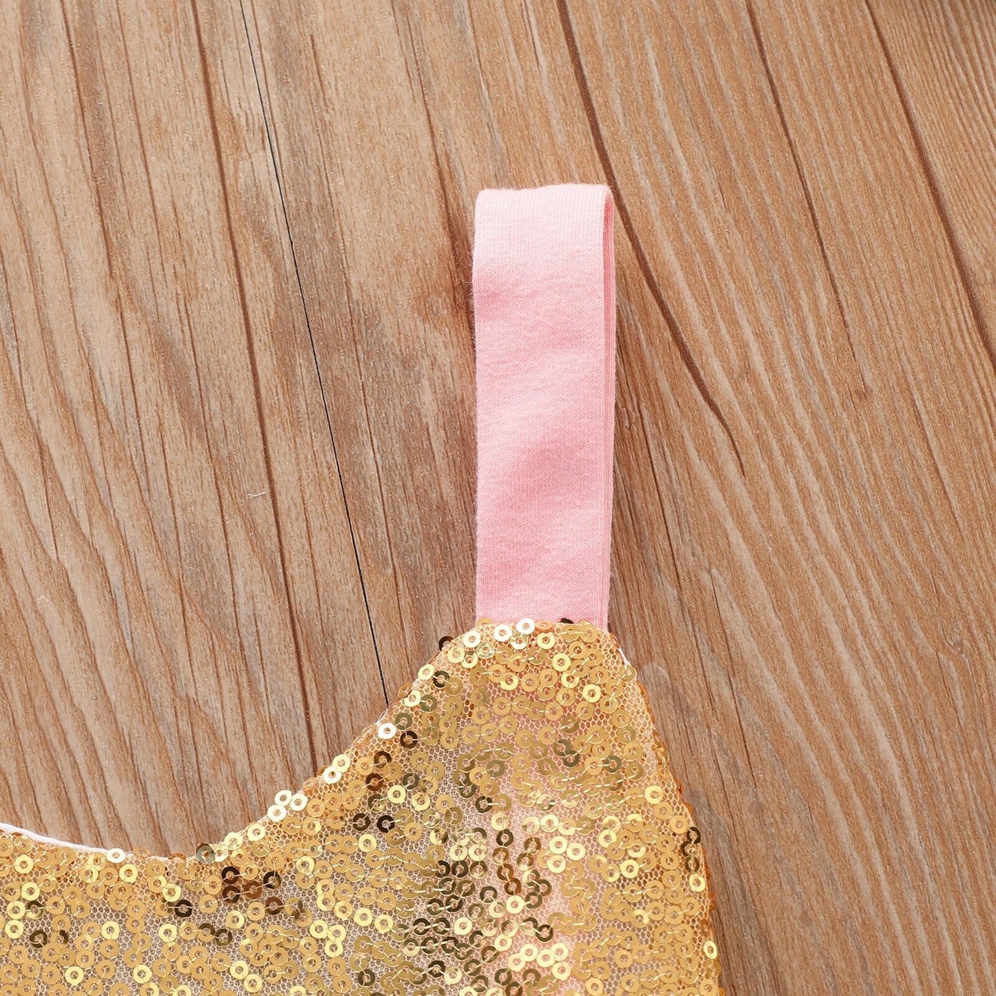 Body infantil dorado