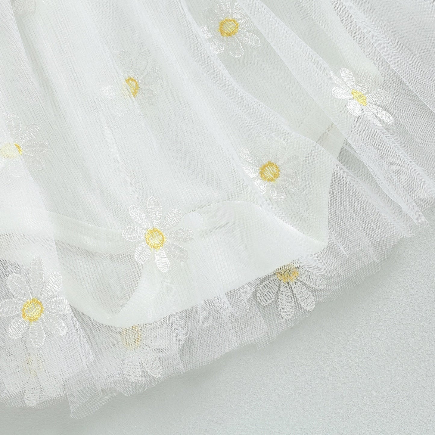 Vestido mameluco de manga larga con volante floral bordado