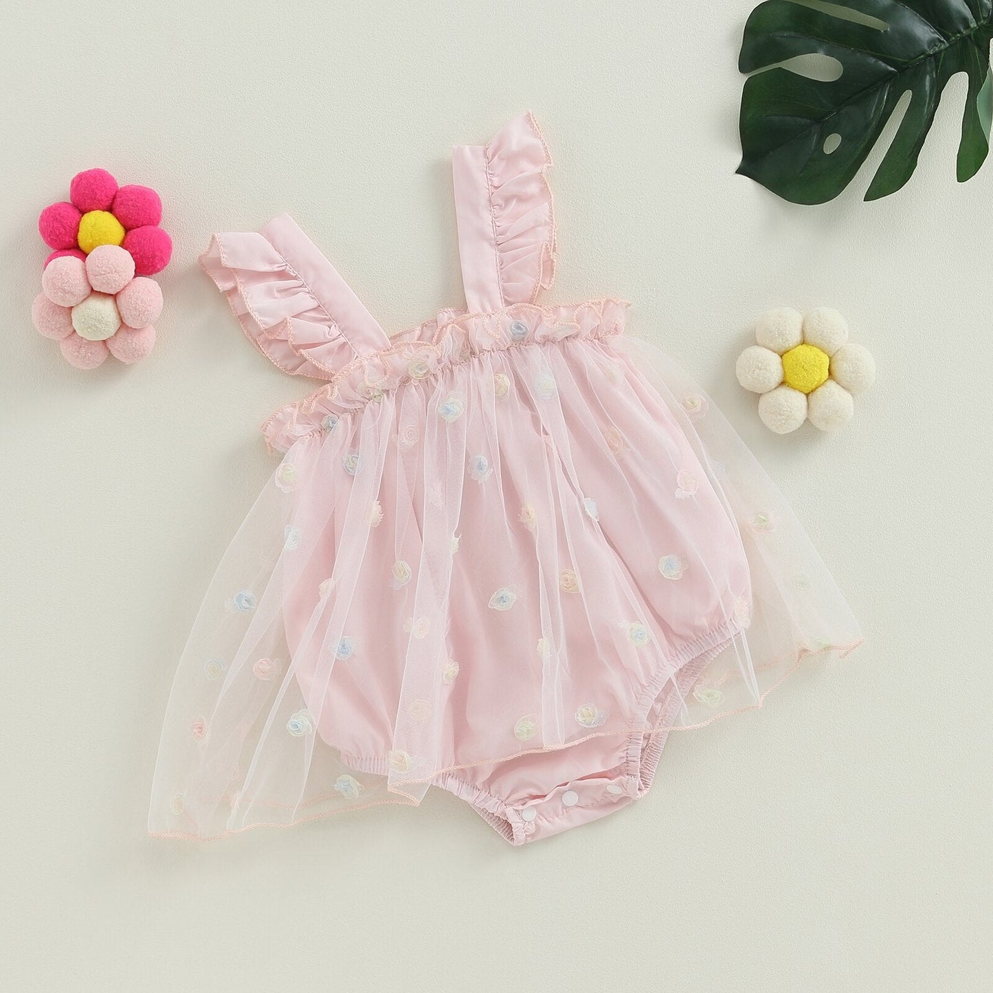 Mono de flores con patchwork de malla