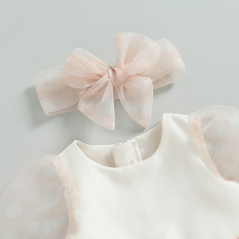 Mono de tul con falda de manga larga