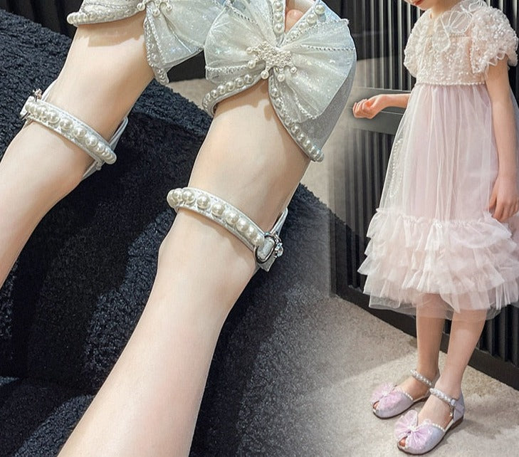 Sandalias con lazo de perlas