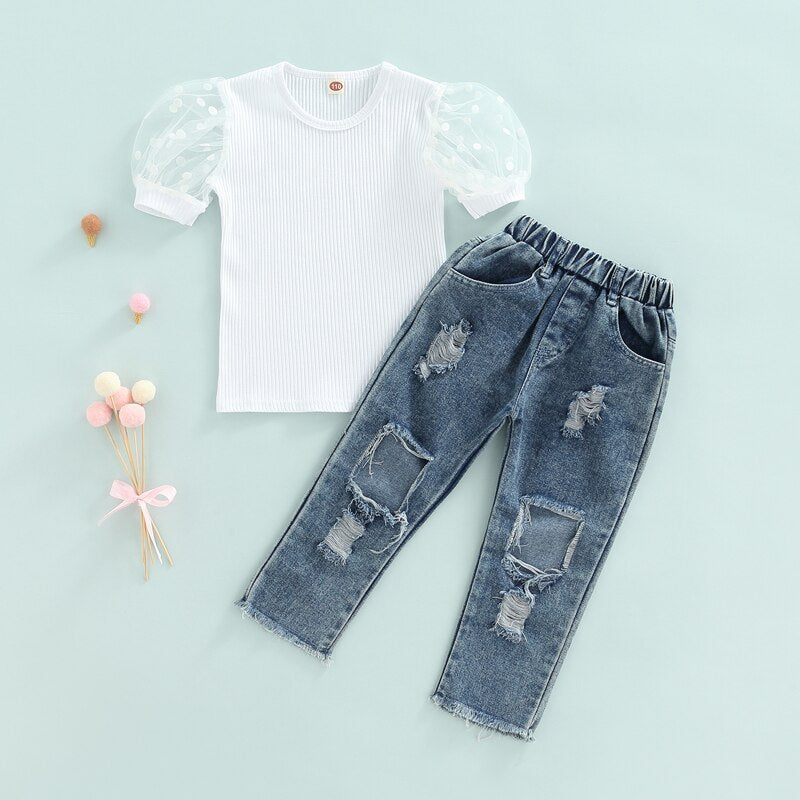 Conjunto blusa canalé y jeans rotos