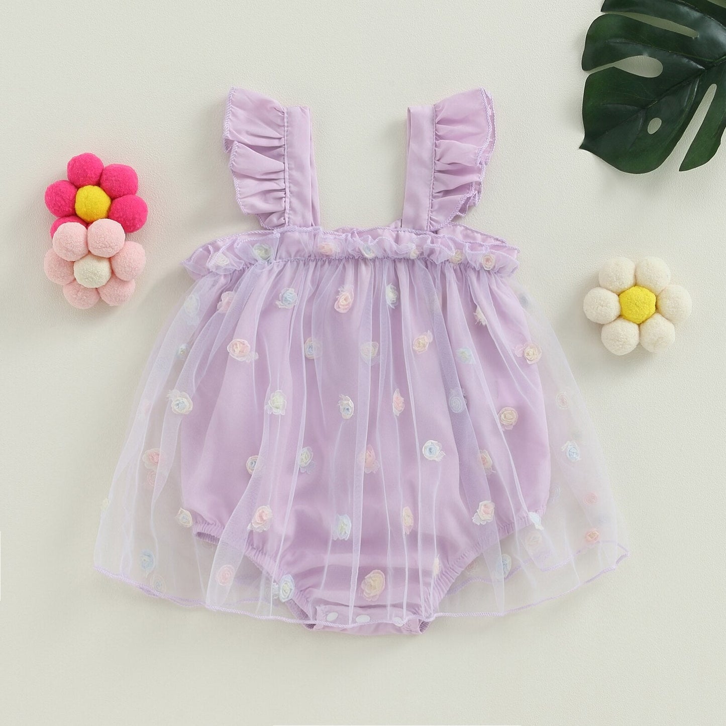 Mono de flores con patchwork de malla