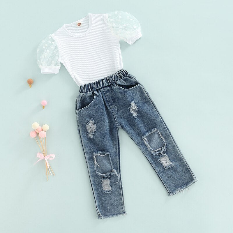 Conjunto blusa canalé y jeans rotos