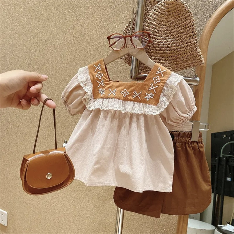 Vestido infantil con volantes bordados
