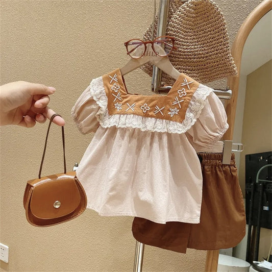 Vestido infantil con volantes bordados
